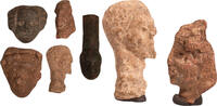 Roman group of head appliqués made of bronze and lead from antiquity -