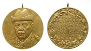 Schützen tragbare Medaille Bronze Brunswiker (Kiel) Schützengilde, zum Gedächnis an Wilhelm Hansen, Büste in Schützenuniform und Orden von vorn / Mehrzeile -