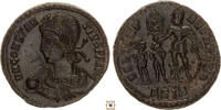 Roman Empire centennionalis Emperor holding labarum, two captives to left -
