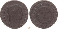 Roman Empire AE follis Cuirassed bust / Two soldiers, two standards and 'F' between them -
