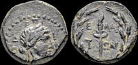Aiolis AE14 Aiolis Elaia Time of Augustus AE14 torch with wreath -