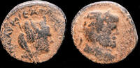 Mesopotamia AE20 Mesopotamia Edessa Caracalla AE20 Tyche to right -
